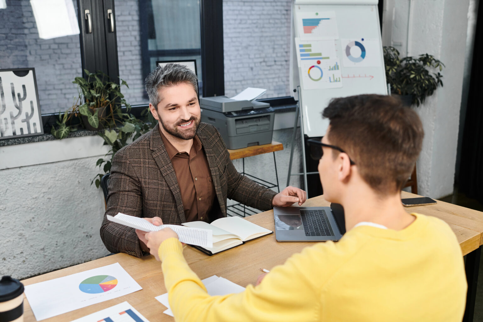 Team members discussing interactive content for SEO strategy in a business meeting