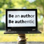 Laptop screen showing the words 'Be an author Be authentic'.