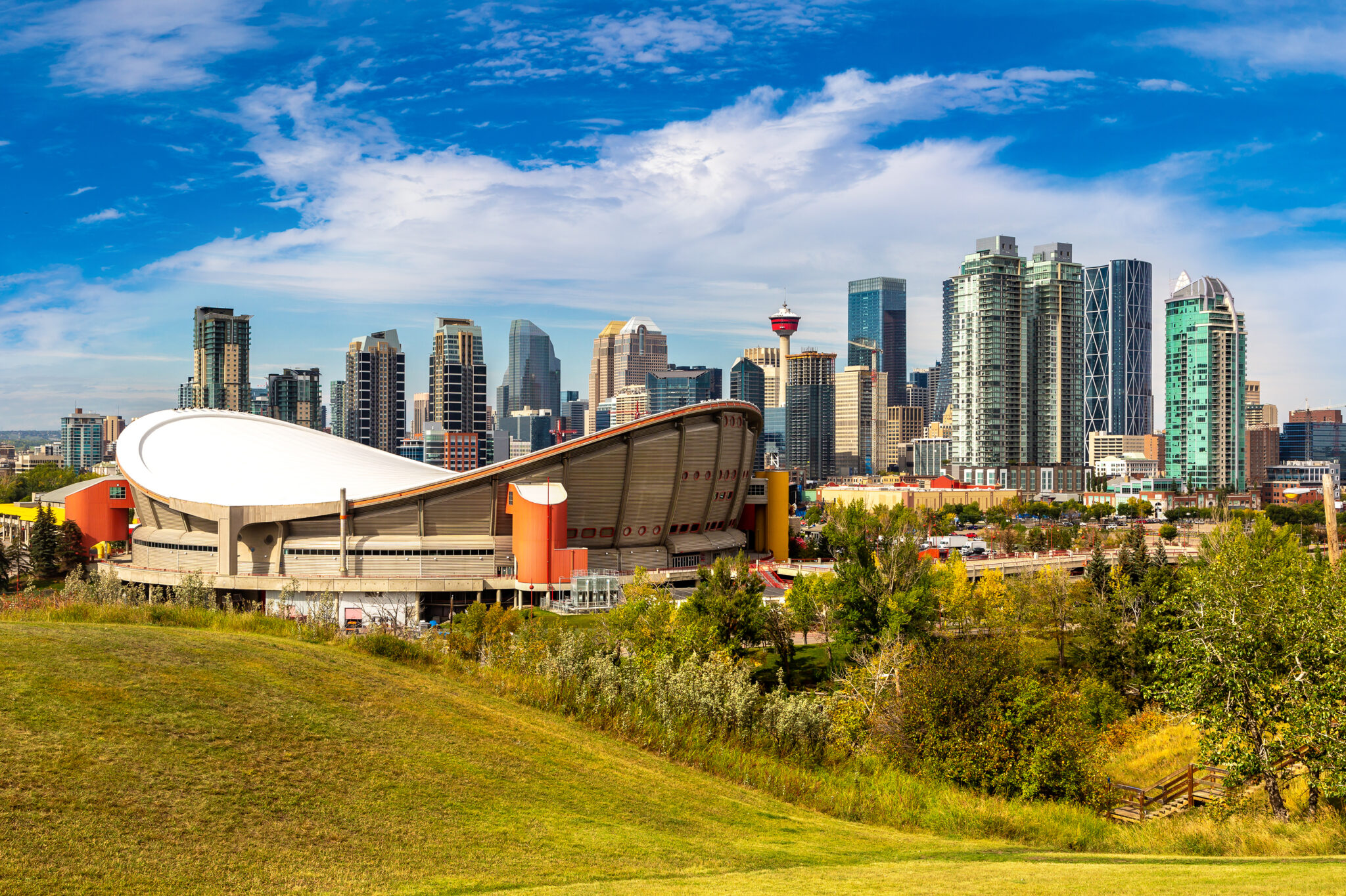 Calgary skyline at sunset with downtown towers and Bow River, home of InspiringClicks digital marketing agency