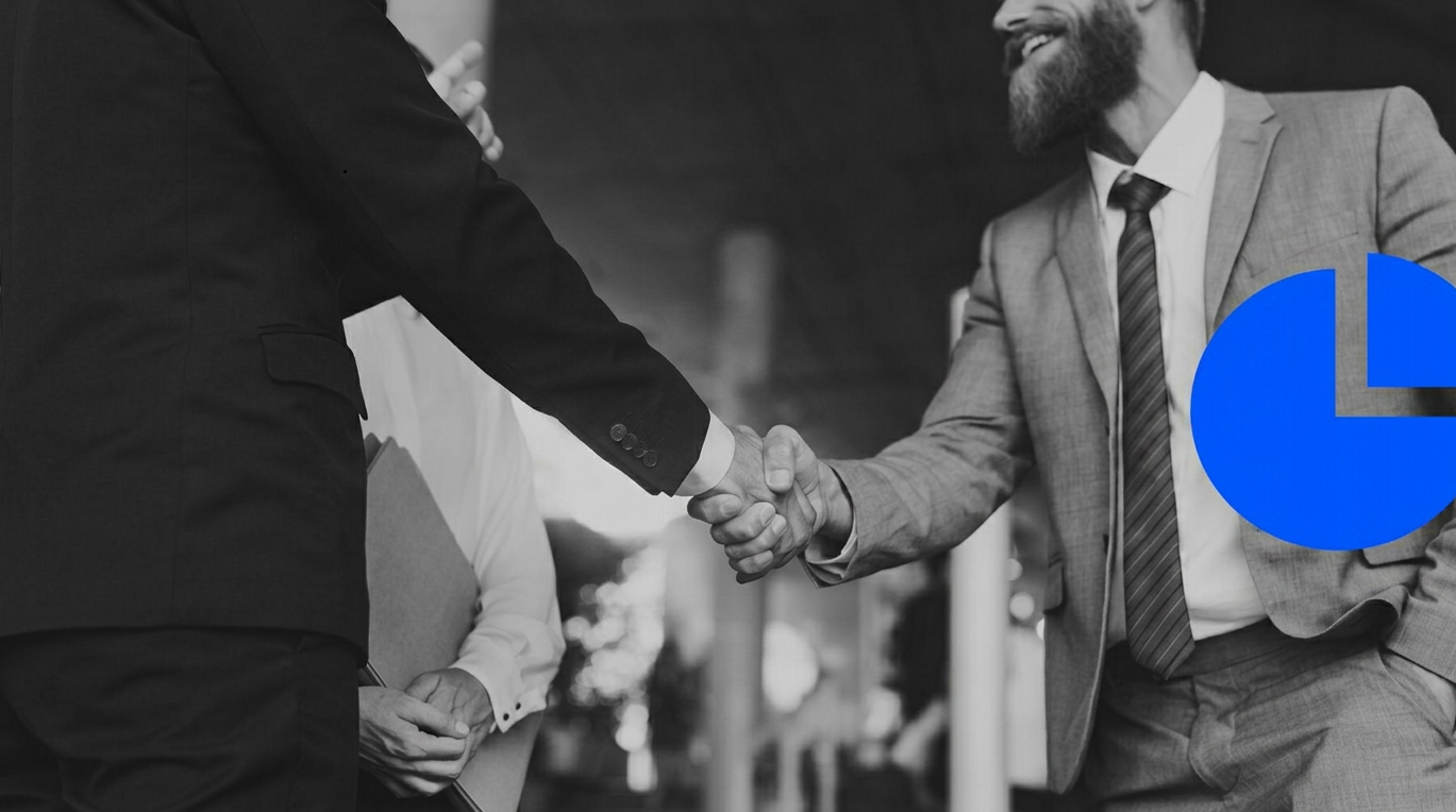 Professional marketing team shaking hands with a client for reputation management support